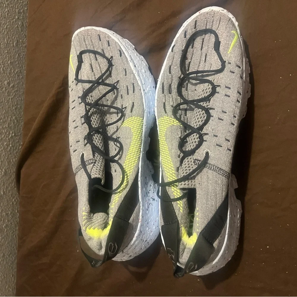 Gray and Yellow Athletic Sneaker Nike Space Hippie fits men size 12.5